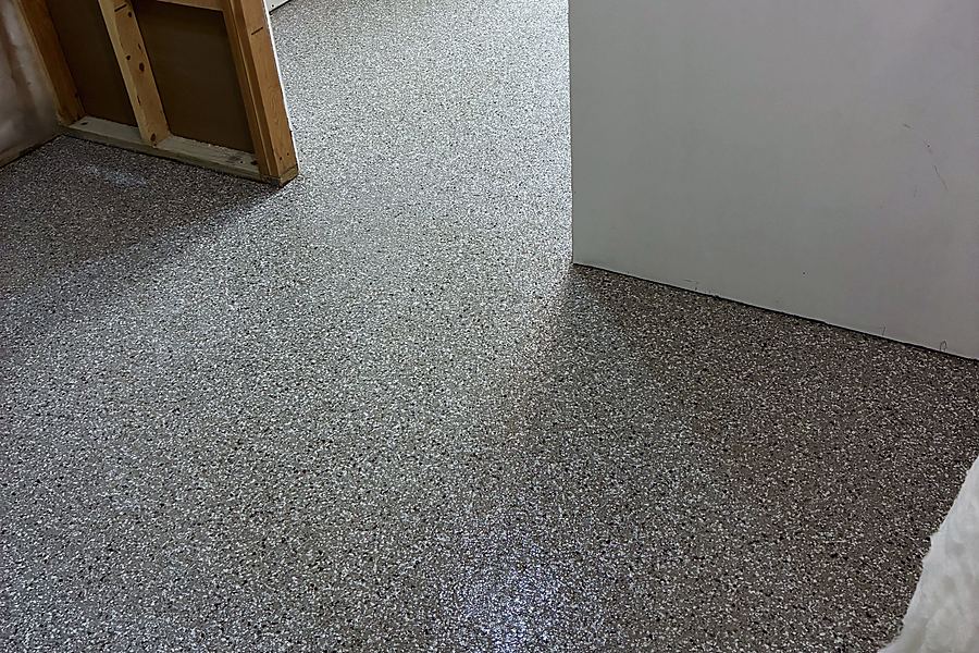 The same utility room with the finished flake floor