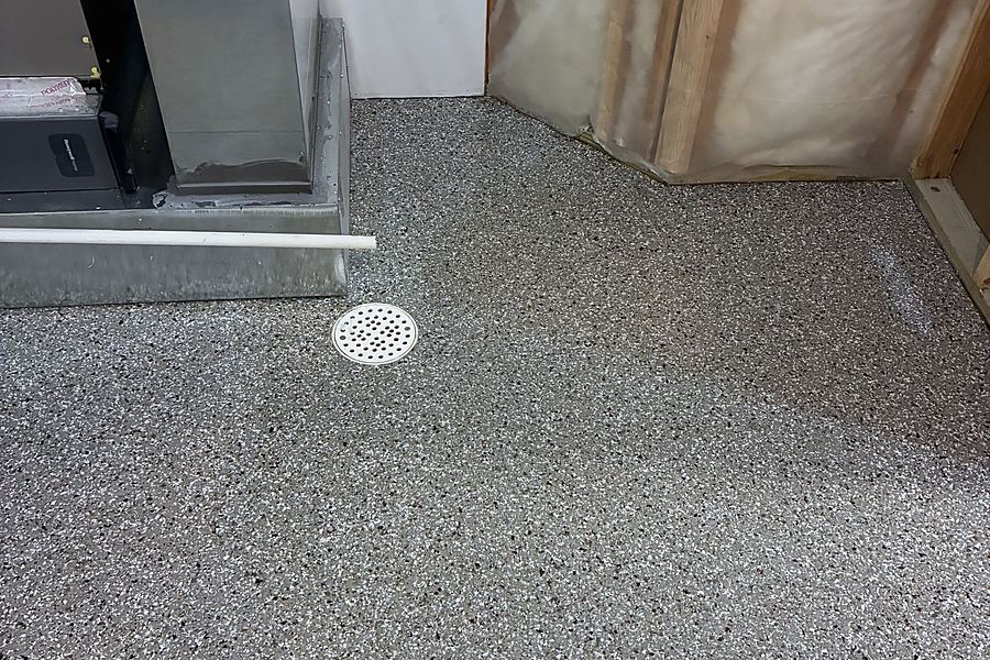 The same room with the finished flake floor and coved base